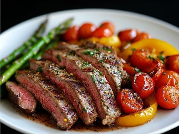 This healthier take on a classic steak dinner combines the robust flavours of Montreal seasoning with lean beef and a medley of colourful roasted vegetables. It's a perfect balance of protein and nutrients, all prepared in under 30 minutes for a satisfying weeknight meal.